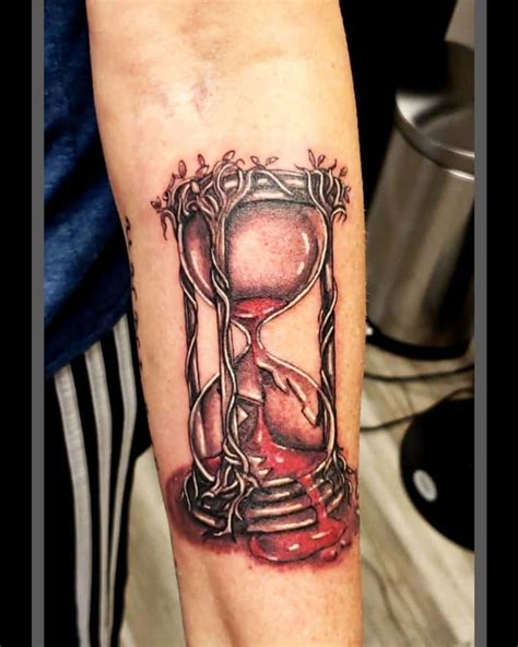 hourglass meaning tattoo|hourglass with clock tattoo.